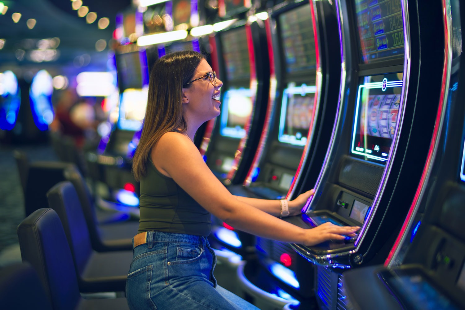 Girl playing slot machine