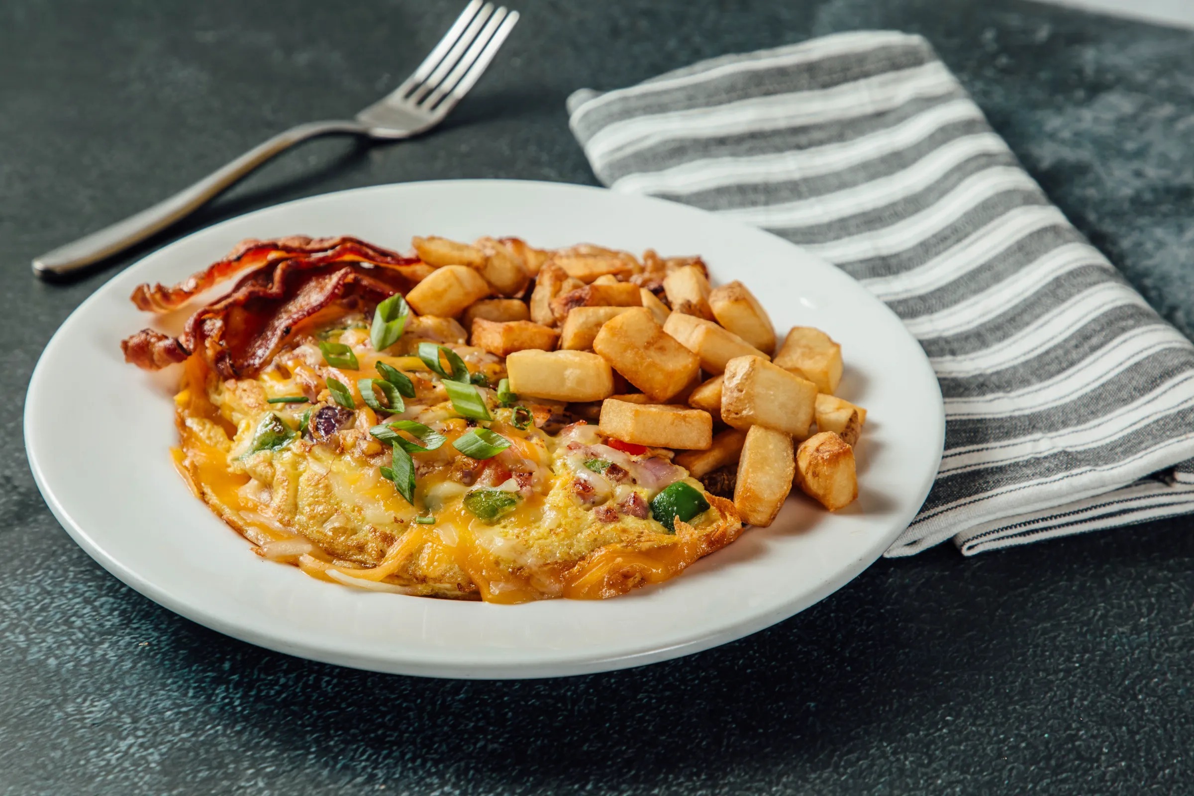 Breakfast omelette and potatoes